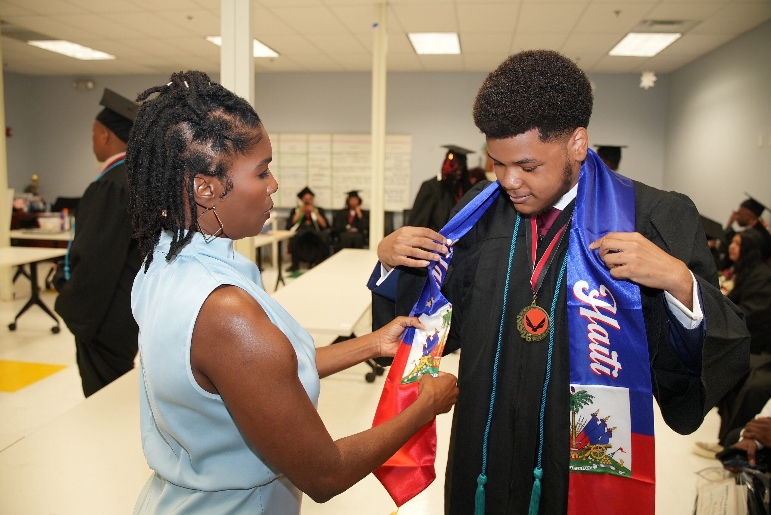Teacher helping student at Ascend Academy